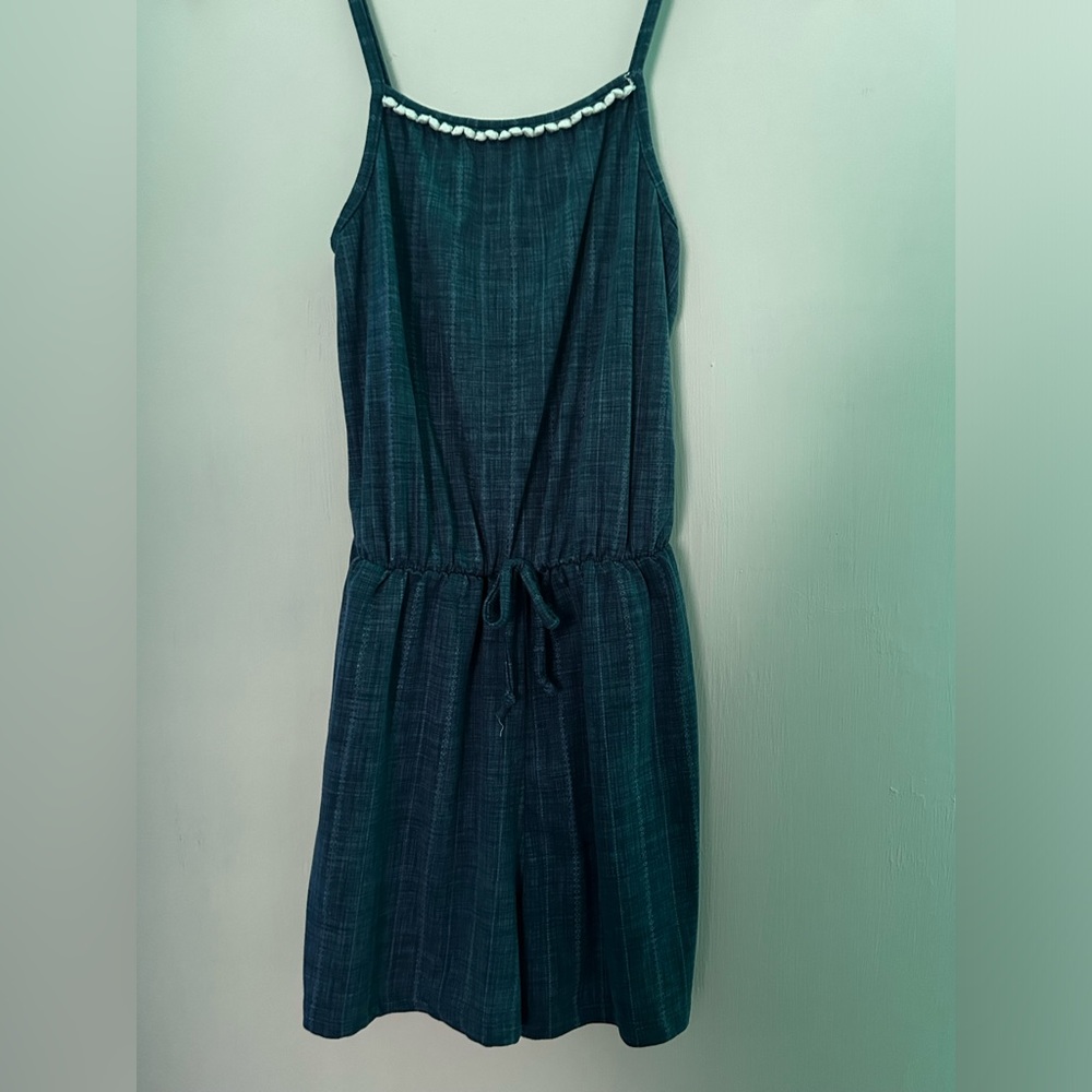 I am selling a blue and white romper in kids size 12 by Love Maddie.